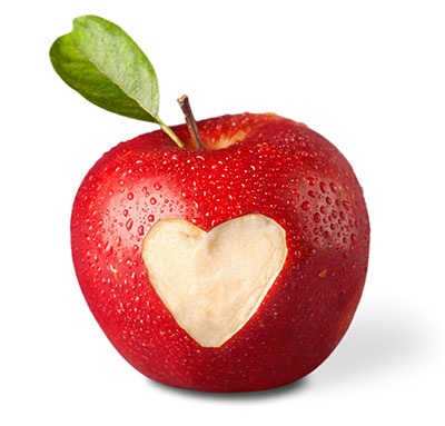 fresh red apple with heart symbol and leaf